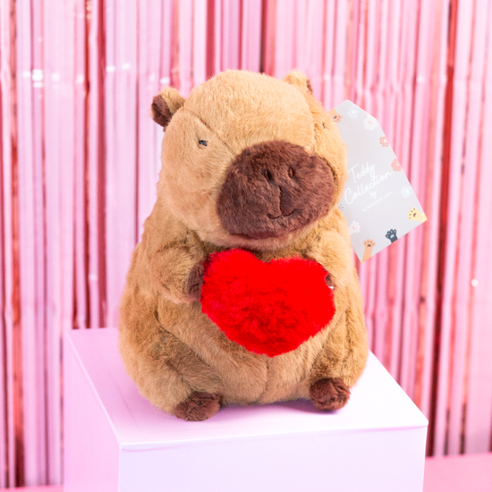 PELUCHE CAPIBARA CUPIDO